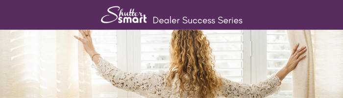 Woman looking out window with white Shuttersmart Shutters