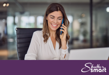 A customer on the phone during a ShutterSMART consultation.