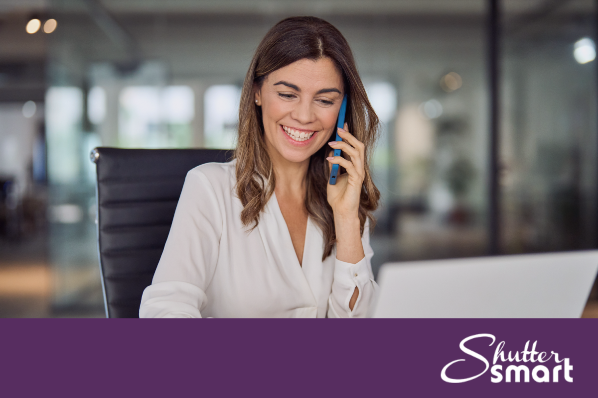 A customer on the phone during a ShutterSMART consultation.