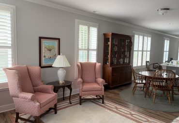 living room with Shuttersmart Planation Shutters